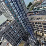 commercial brickwork construction site in London with crane and brick buildings