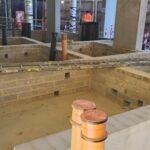 Completed blockwork cavity wall prepared for next construction stage