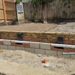 Brickwork installation along fundation