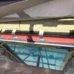 Fire stopping installation beneath window head with cavity barrier detailing