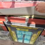 Fire stopping installation around window sill and cavity interface