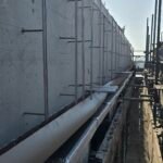 Fire stopping installation along external façade cavity at upper level