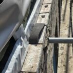 Fire stopping installation to parapet cavity closure with mechanical fixing