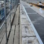 Completed fire stopping installation along parapet ready for inspection