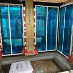 Insulation installation to window base with moisture protection