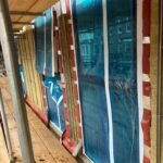 Cavity wall insulation installed to multiple window openings, ensuring consistent thermal performance across the elevation.