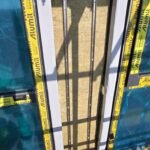 Insulation boards installed vertically within cavity wall system