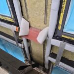 Fire stopping installation beneath external wall element
