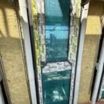 Cavity wall insulation installed around window opening for thermal efficiency