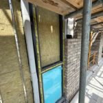 Insulation installation to window opening with continuous thermal layer