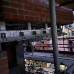 Brick and masonry support beneath suspended floor construction